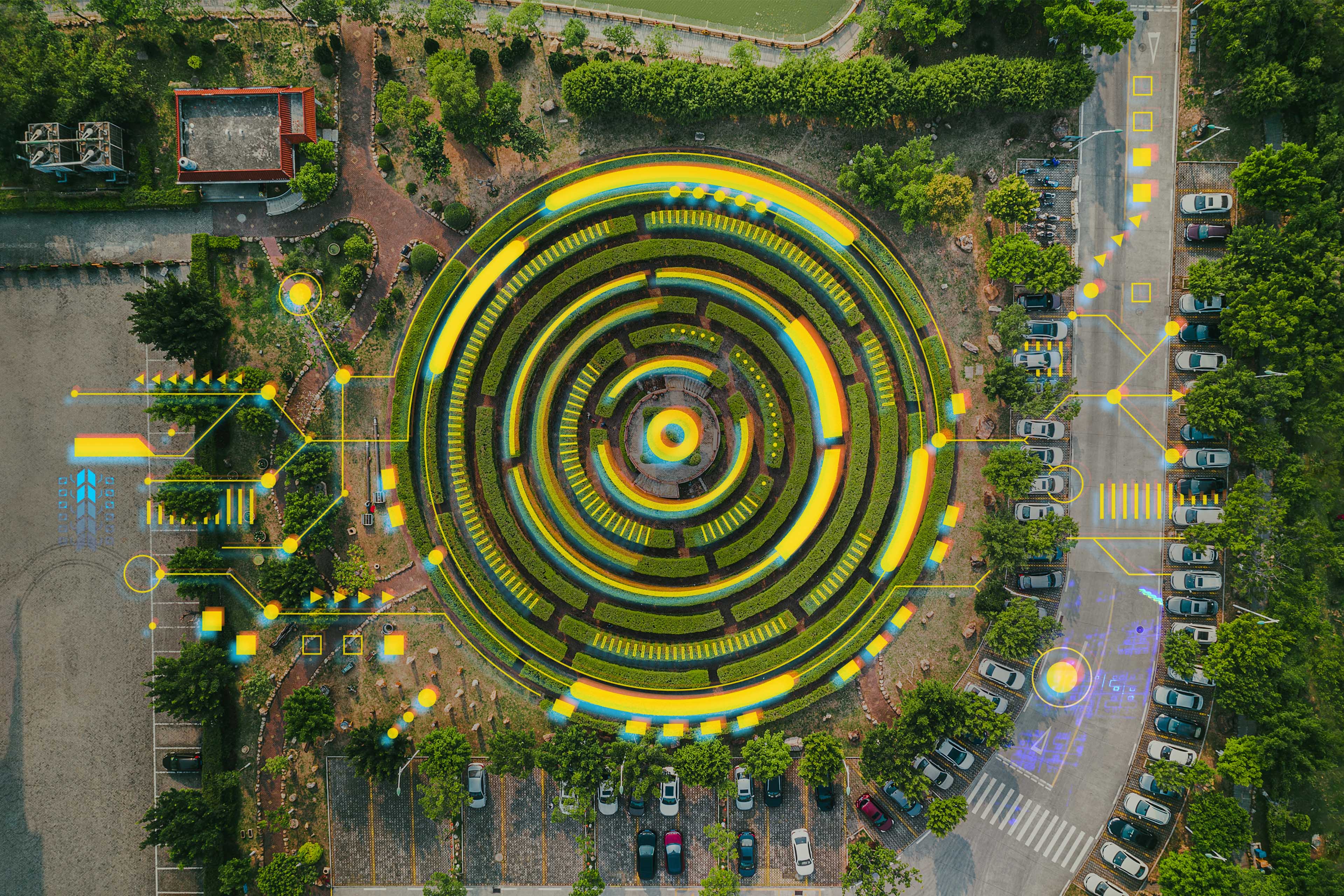 Aerial view of a circular garden maze and green pavilion Aerial view of a circular garden maze and green pavilion