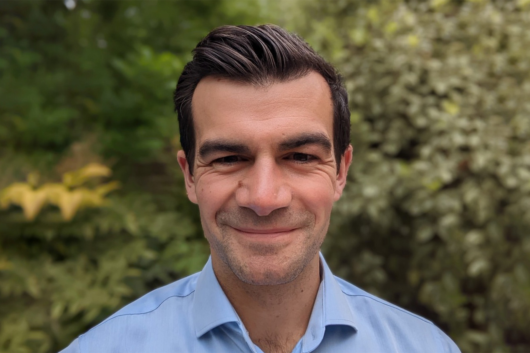 A portrait of Hugh Salway, Senior Director, Market Development and Partnerships, The Gold Standard Foundation
