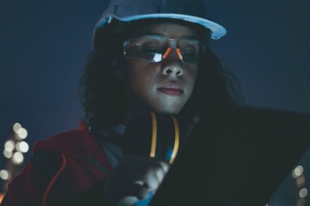 mine engineer-using-laptop-at-night