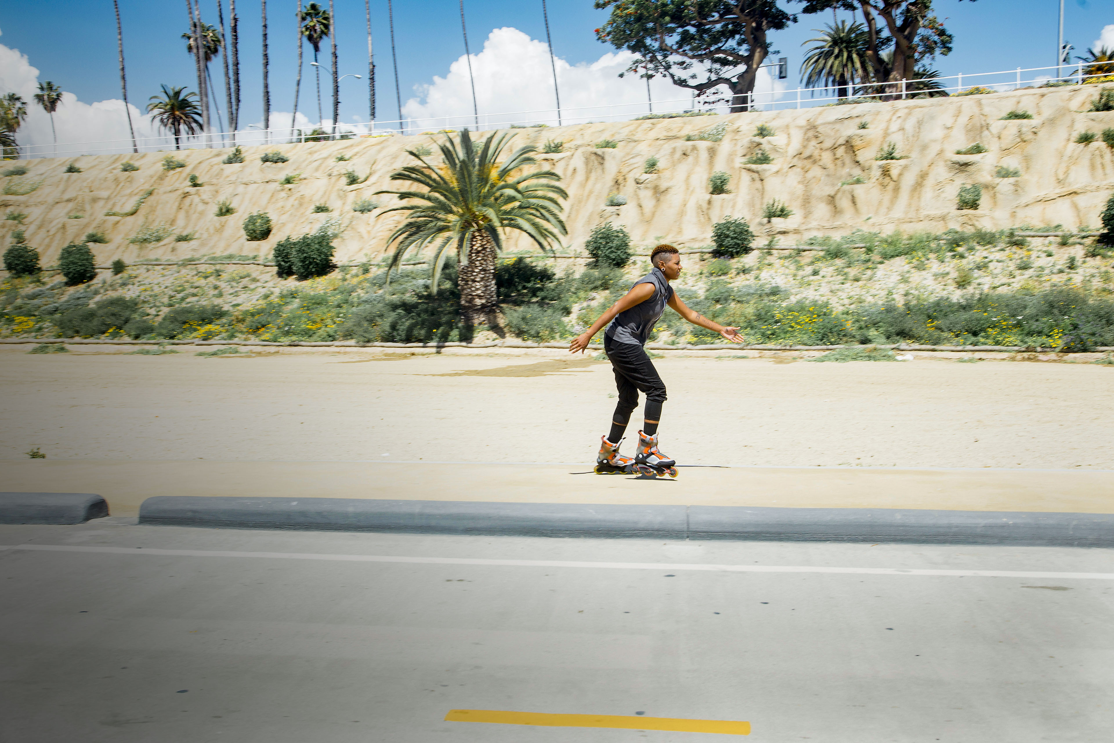 Woman skating on rollerblades